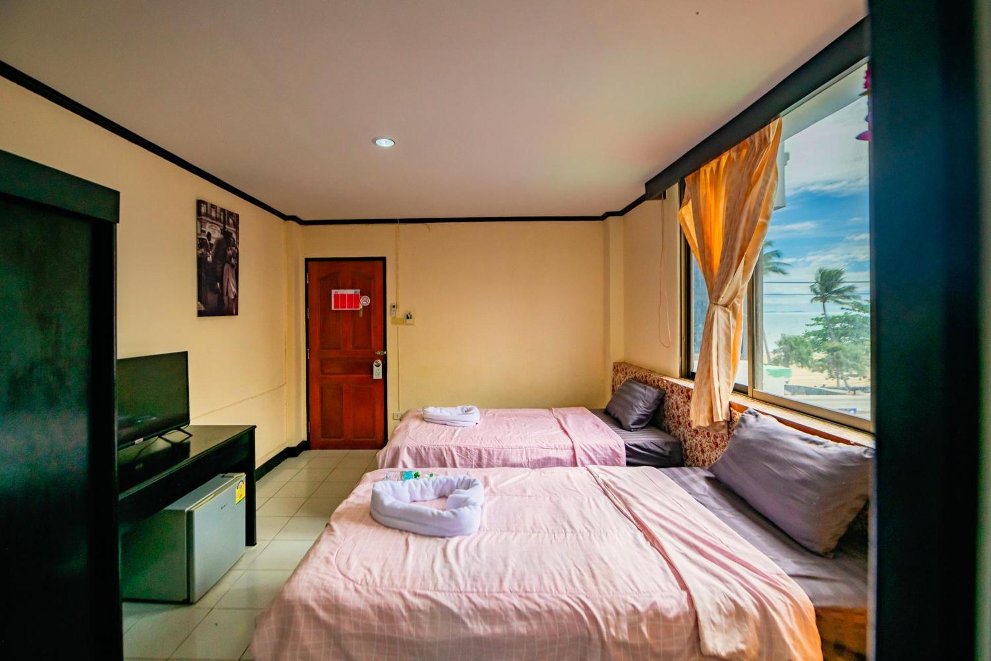 Happy Jomtien - Beachfront Zimmer foto